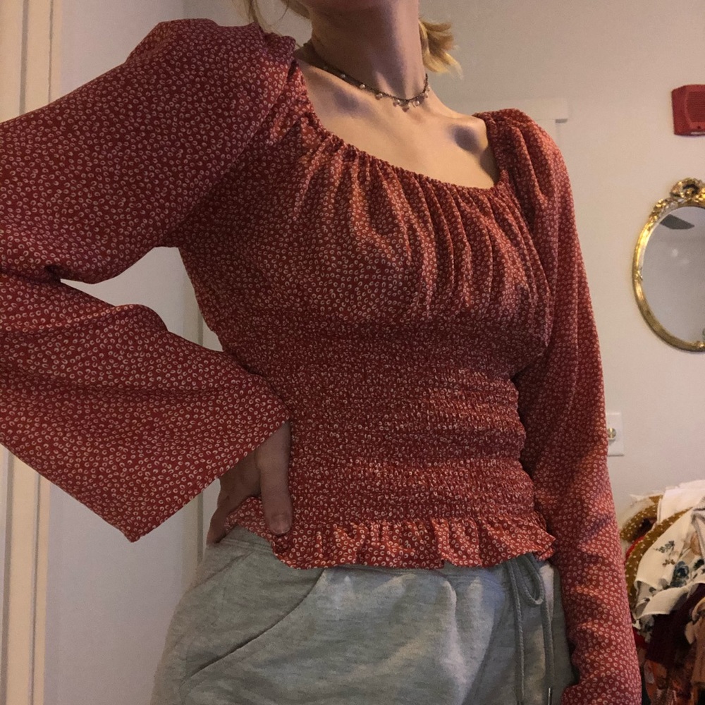 ruffled blouse with cinched waist